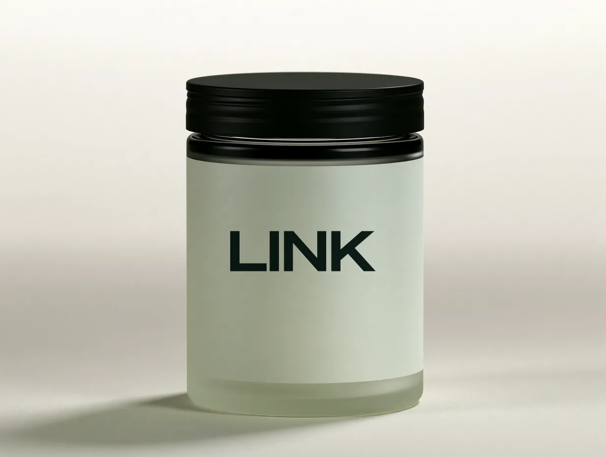 A LINK-branded frosted glass jar with a black lid.
